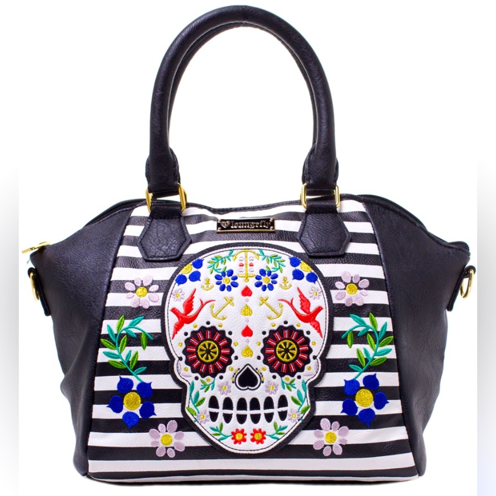 Loungefly Retired striped skull  Crossbody purse in excellent condition
